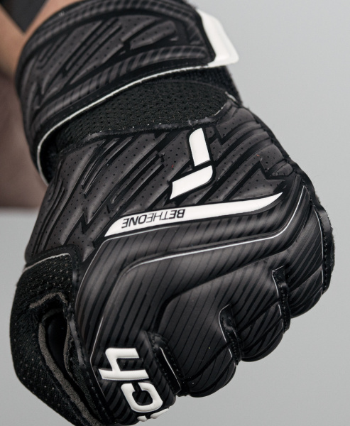 Reusch Attrakt Solid Junior 5272515 7700 black 4.j